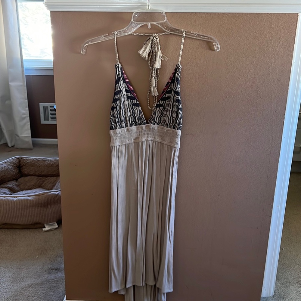Mid length, low back halter dress